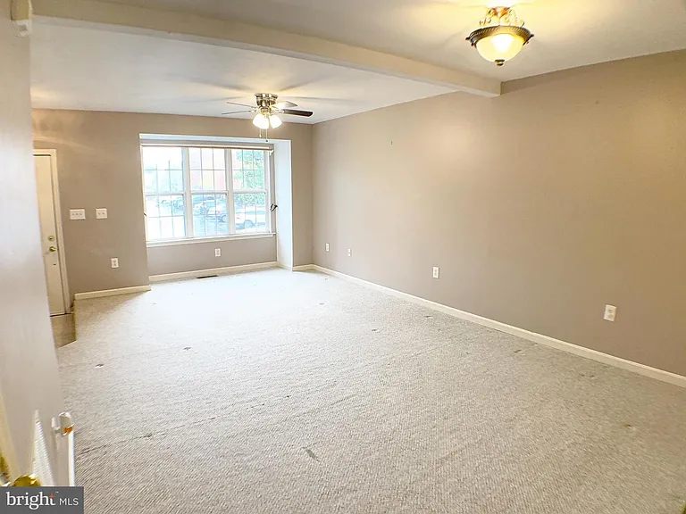 Main level: Living room with open dining space