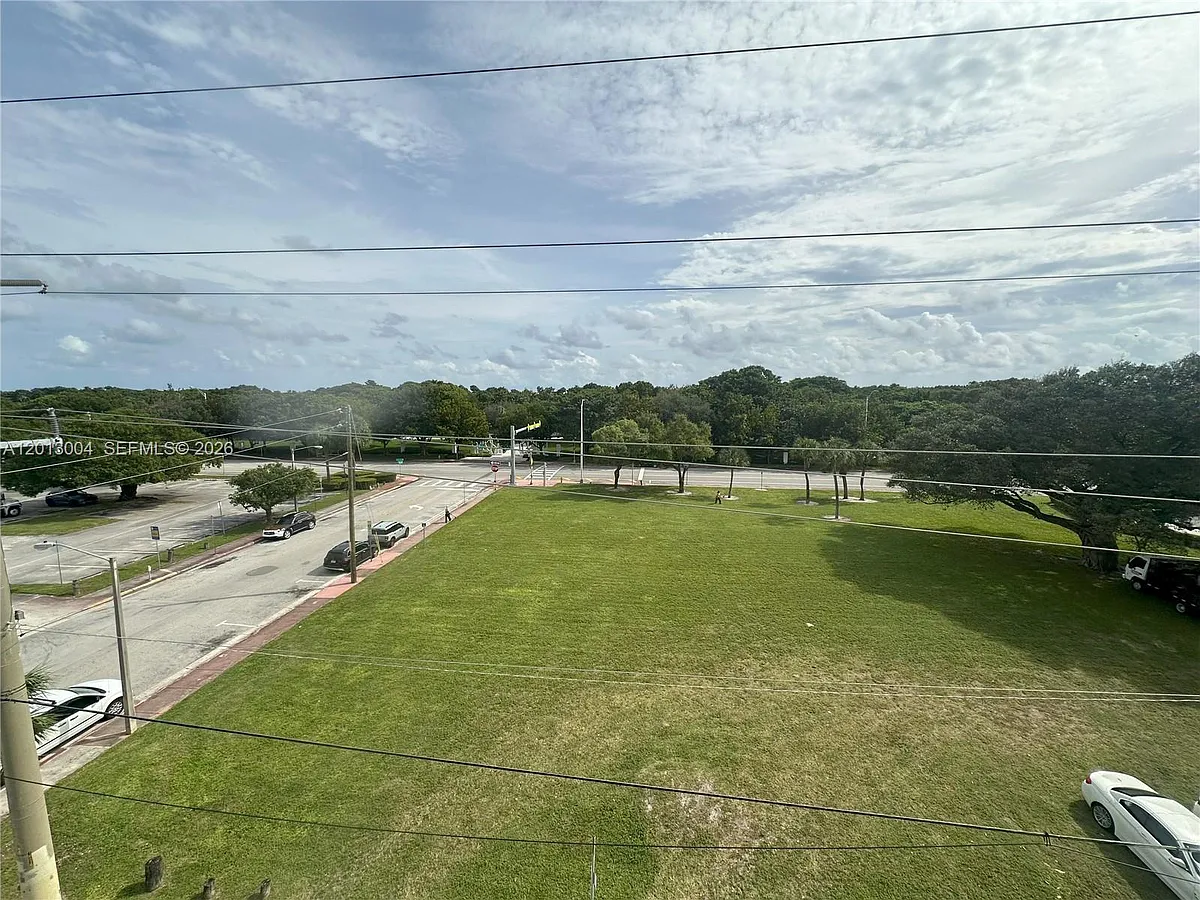 Building Photo - 8233 Harding Ave #503