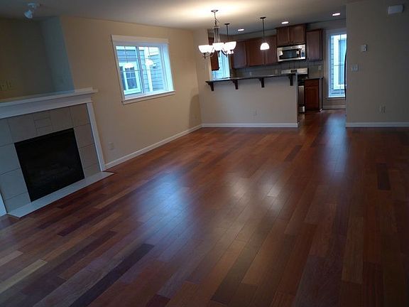 Cherry hardwood floors with gas fireplace
