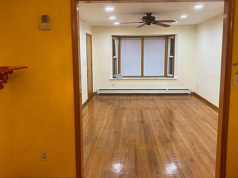 Separate Dinning Area and Living Area with Bay Window, Recess Lights and Ceiling Fan