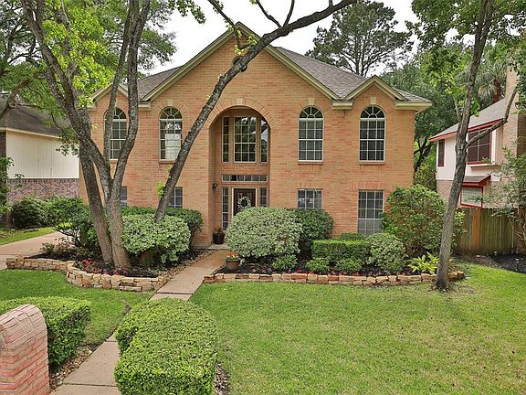 Stunning elevation and landscaping on this Champions Park beauty.