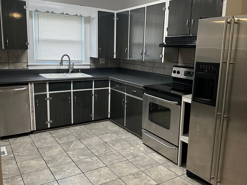 Kitchen with stainless steel appliances and plenty of cabinet space.