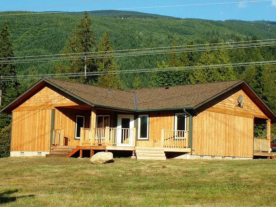 This is the west side of the house with a huge cedar deck for entertaining!