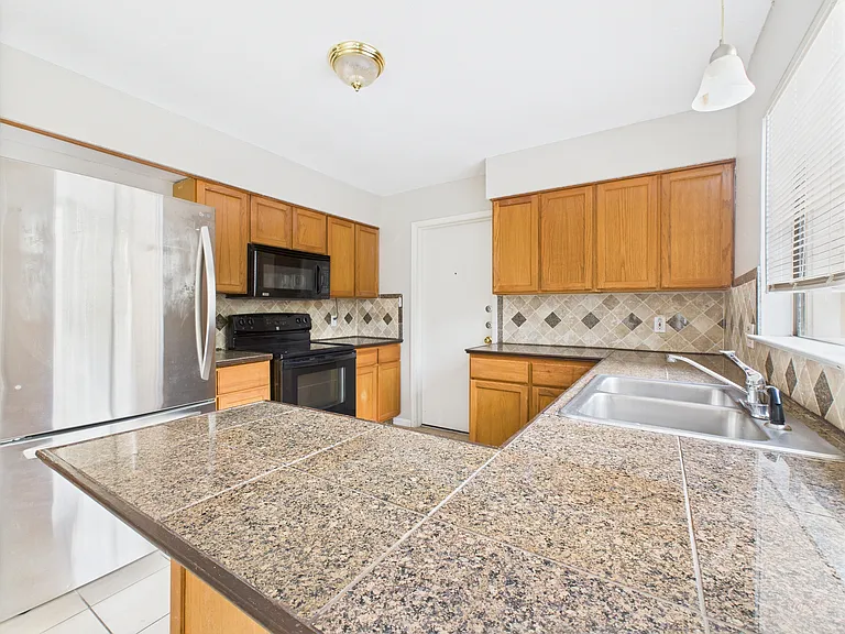 9520 Quail Village Ln — Photo 16