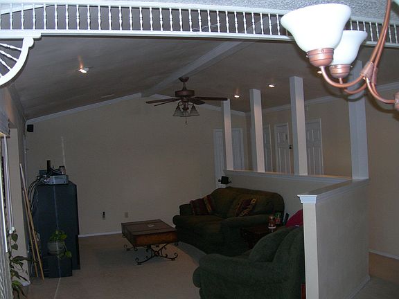 Open Living Area w/ Crown Molding Throughout