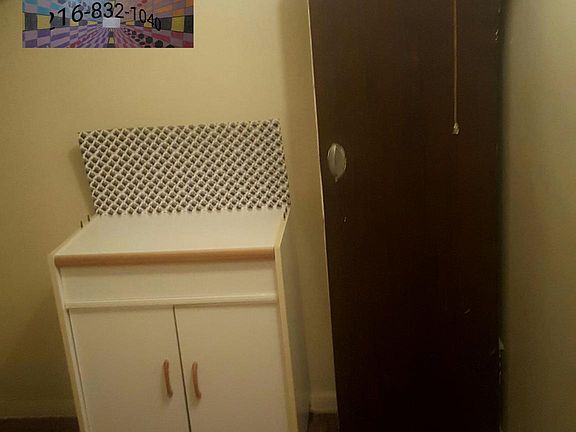 Spaciousness Possible Office or Storage Room