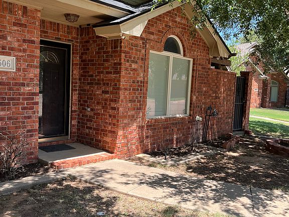 Front entry with glass storm door.
