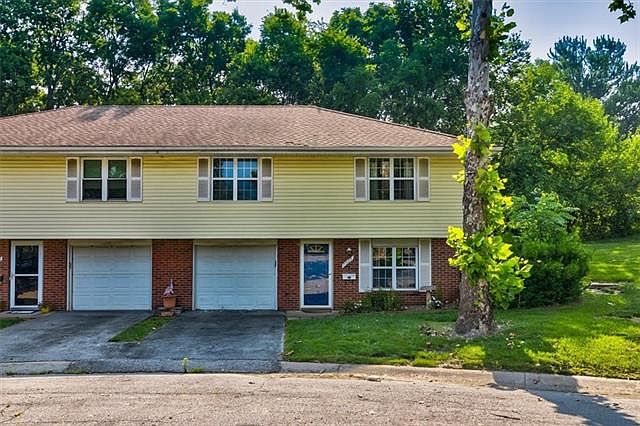 1st image of 7027 NW Chapel Woods Ln