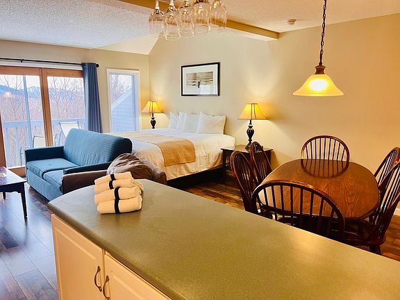 Living area, dining area, additional king bed