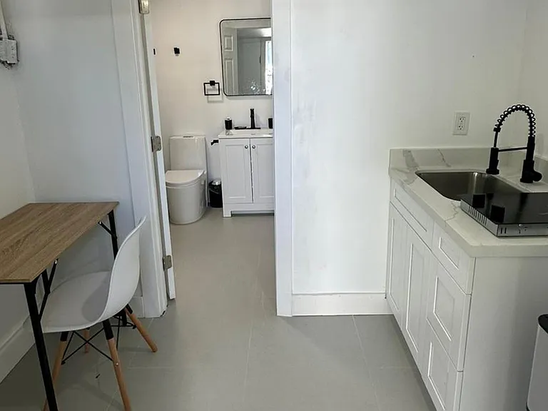 Desk, Stove Sink, bathroom, fridge