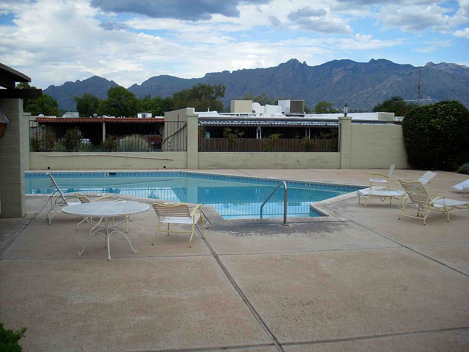 Community pool area has hot tub, grills, clubhouse with kitchenette, and restrooms. Tennis court also on site.