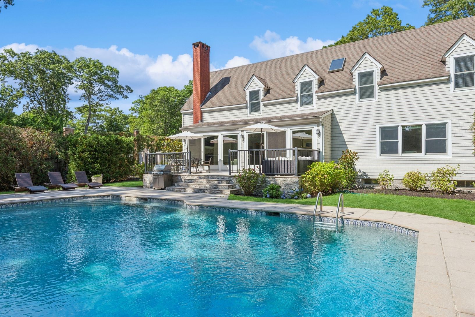  View of Pool, Patio and back yard