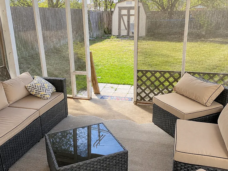 Covered and screened in patio!