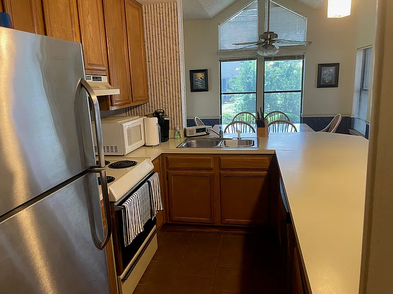 Large open-concept kitchen with ample counter space.
