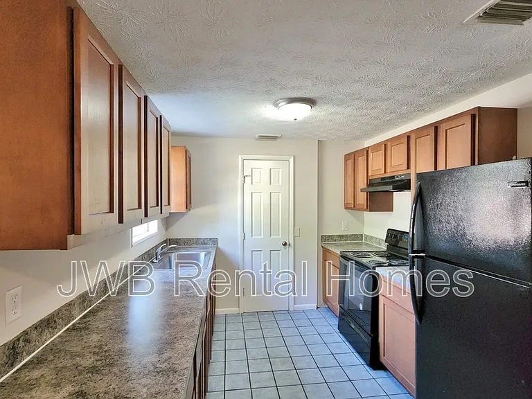 6976 Gribbin Ct — Photo 2