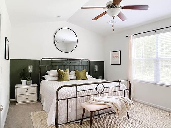 Master bedroom with bathroom and two closets.