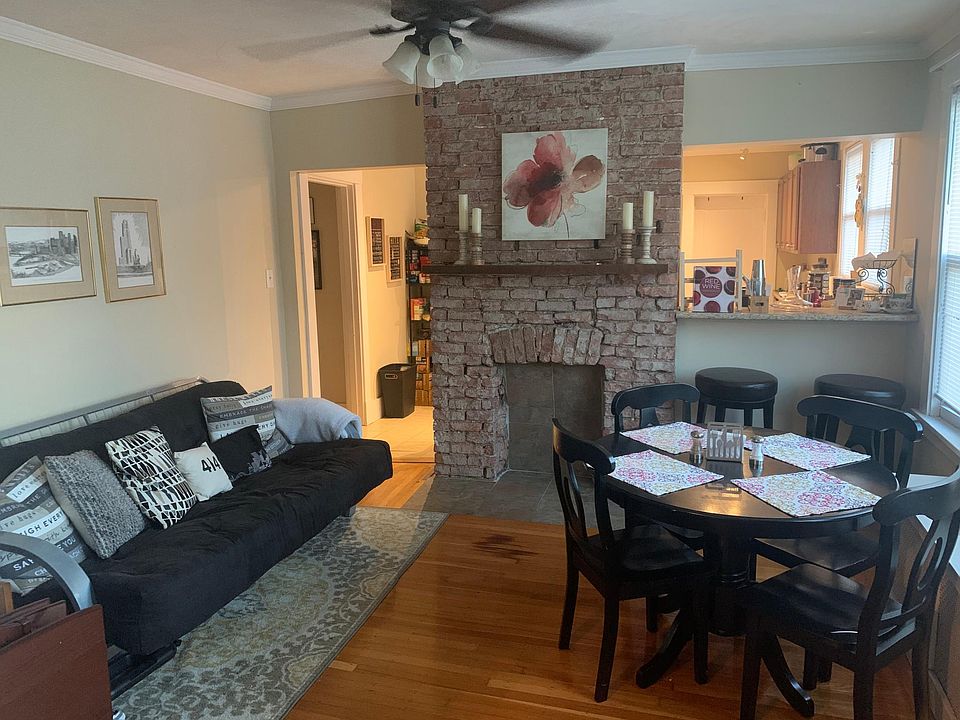 Bright dining room with breakfast bar. Open to kitchen!