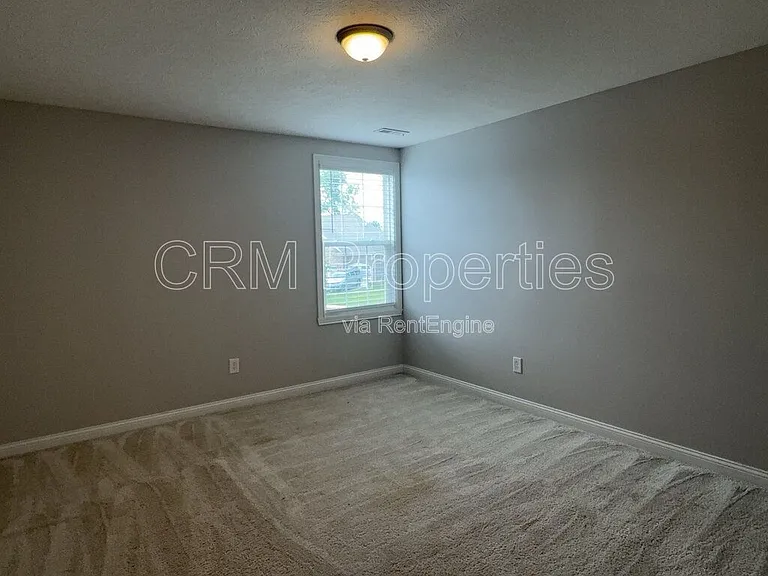 6311 Burgin Dr — Photo 32