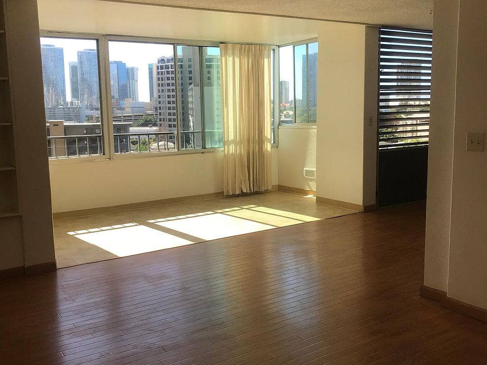 Living room with extended lanai.