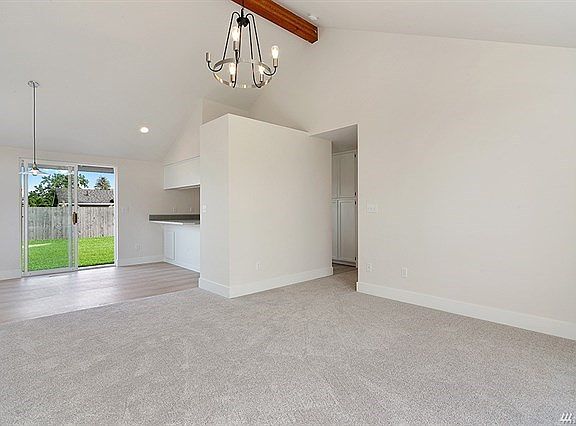 Living Room Opens to Large Dining Area