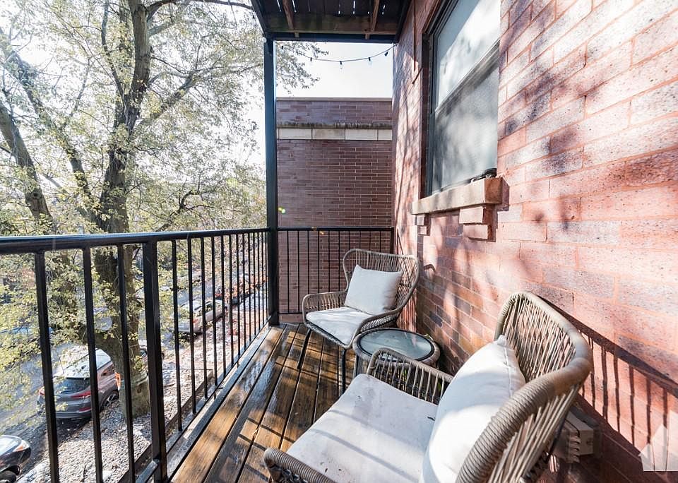 Patio off primary bedroom, overlooking McLean Ave - perfect for morning coffee!