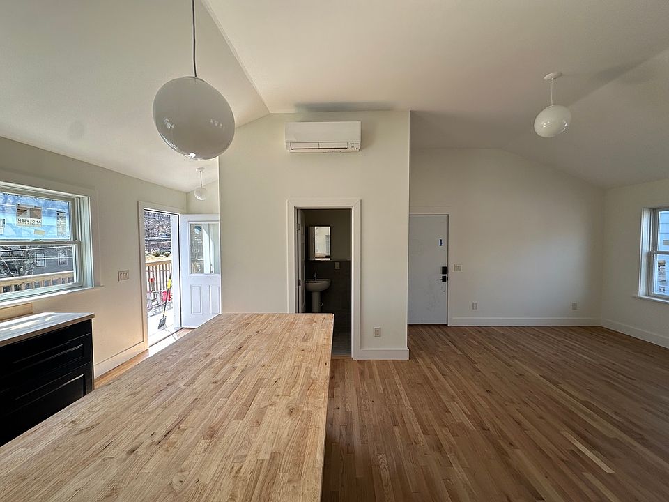 Porch and Hallway Entrances - Kitchen, Living, Dining, and Half Bath - Coat Closet across from Porch entry not pictured.