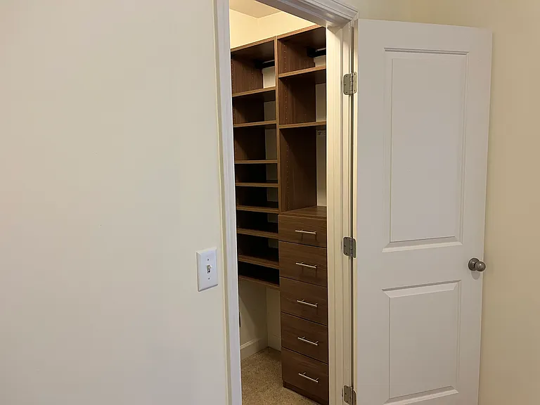 Custom closets in main bedroom