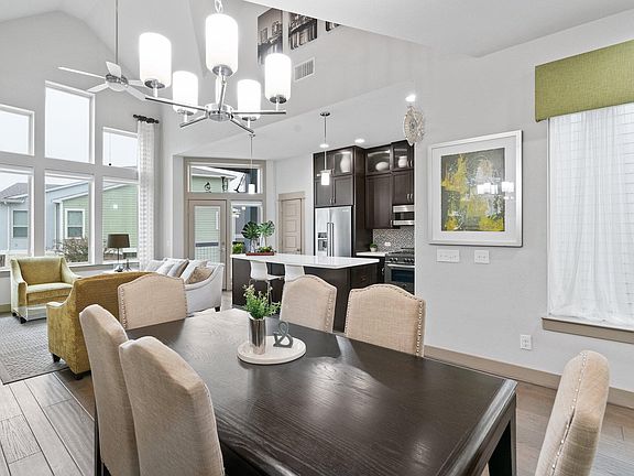 Common area, living, dining, and kitchen