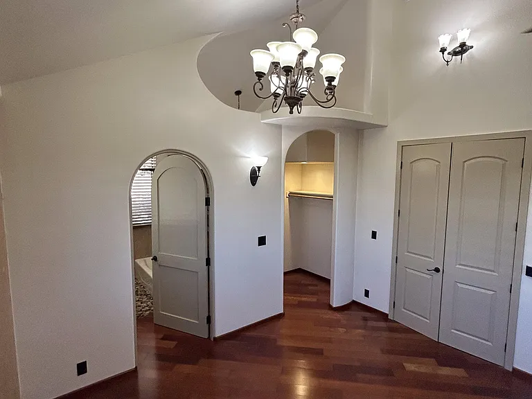 View from inside master bedroom. Master bathroom is the opening on the left, walk-in closet opening on the right.