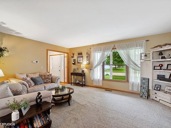 Spacious living room with abundant windows for natural light!