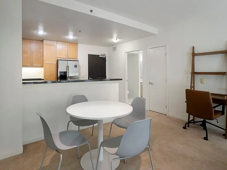 Furnished+ apartment homes include a dining set (Representative Image exact items and style of furnishings may vary)