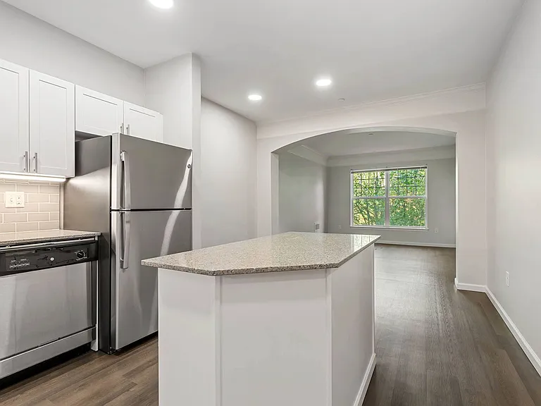 Open-concept kitchens complete with upgraded appliances and countertops