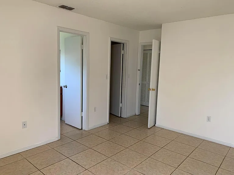 Primary Bedroom with Walk In Closet and Updated En-suite Bath