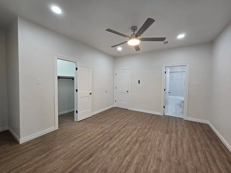 Master Bedroom with a balcony