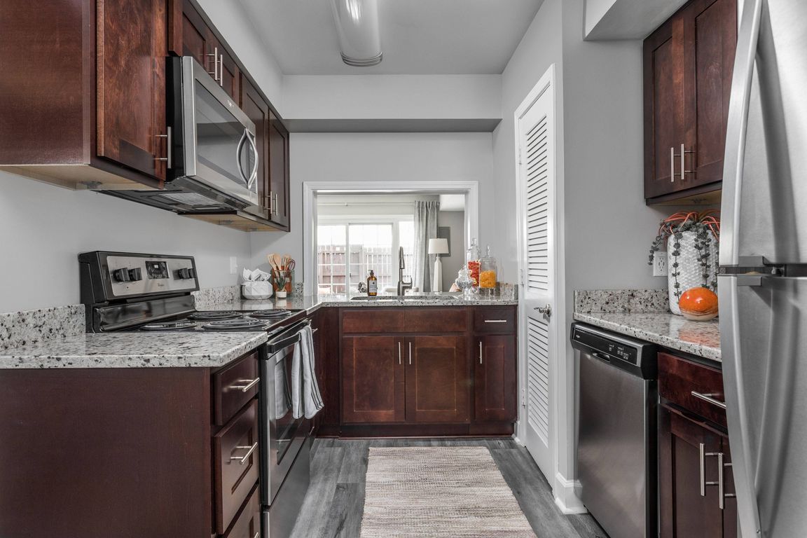 Kitchen with Granite Countertops and Stainless Steel Appliances