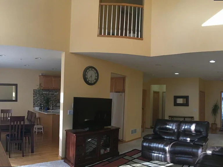 Main Level with all ceiling and adjacent dining room