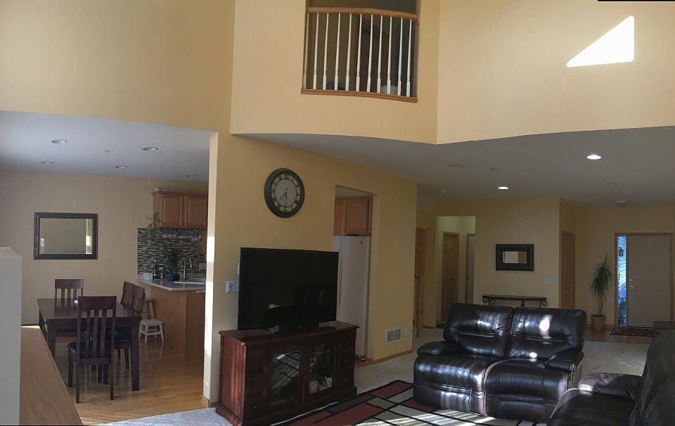 Main Level with all ceiling and adjacent dining room