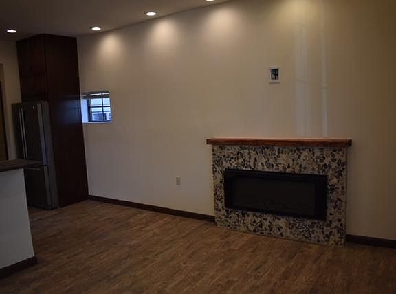 Electric Stone Fireplace with option to mount TV above (located in living room)