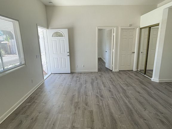 Living Room with Newly Installed Easy to Care for Laminate Flooring