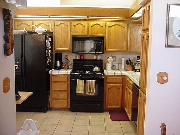 Tile floors, warm cabinets 