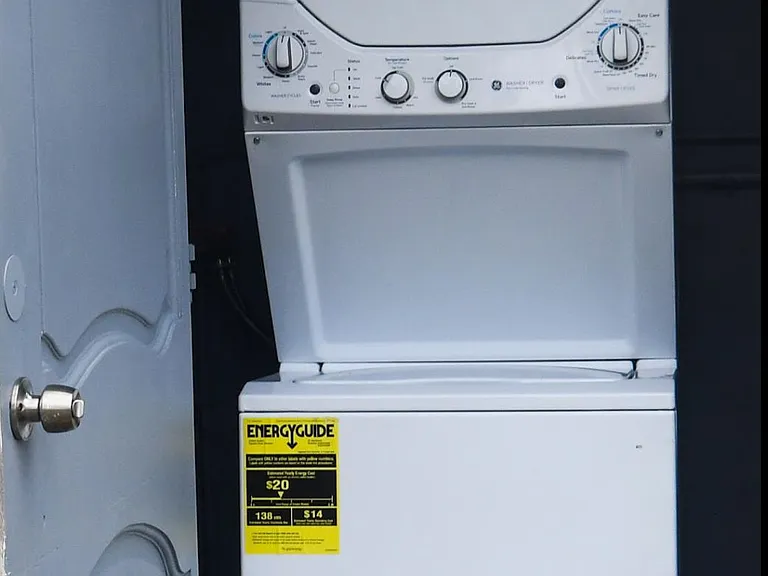 rand new washer/dryer located in laundry/storage closet.
