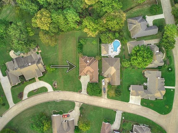 Property line extends past the fence to the middle of the creek. Lot to the left is owned by adjacent property owner for ultimate privacy!