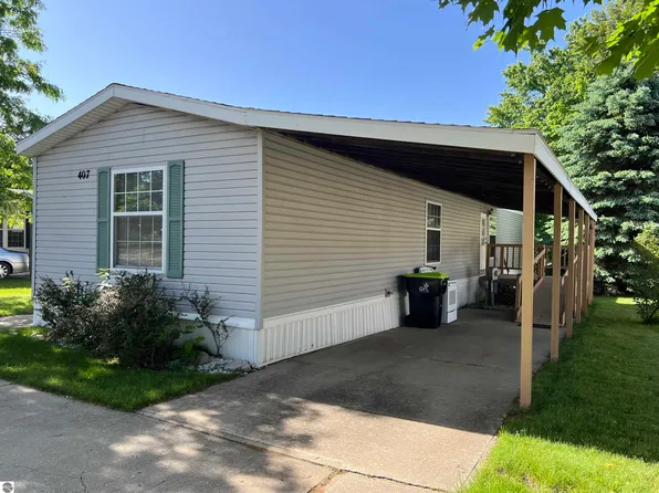 407 Thistlewood Dr, Cadillac, MI 49601