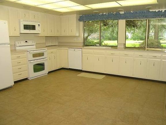 Spacious kitchen with tile floors
