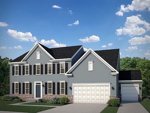 Federal with Stone Water Table and 3 Car Garage