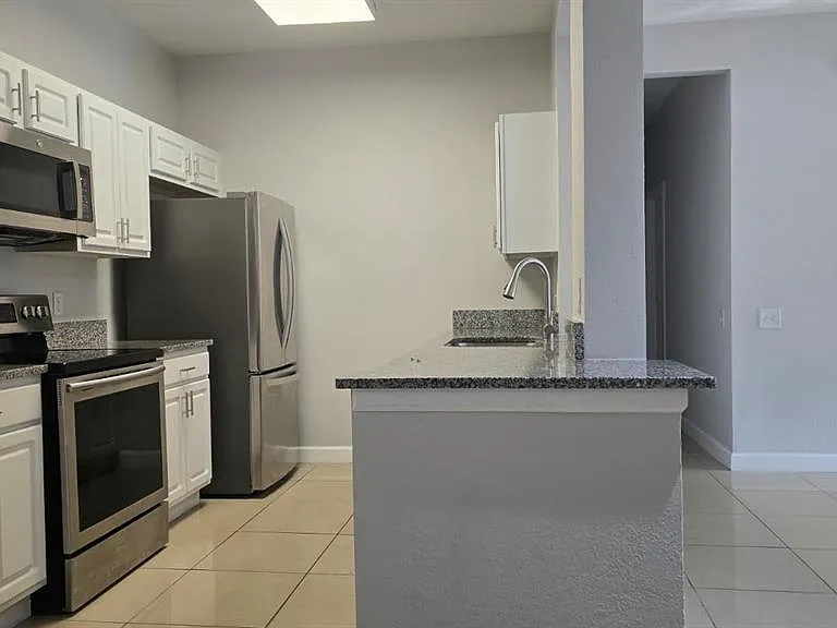 7147 Yacht Basin Ave #114 — Photo 2