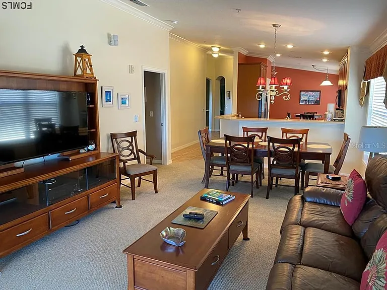 Living room. Entertainment center with large TV, Roku and Stereo.