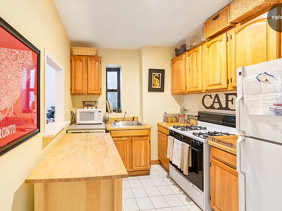 5th image of 214 E 17th St APT 4