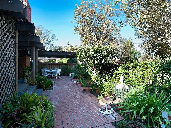 Rear gardens with covered patio