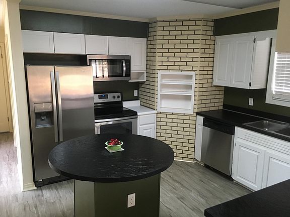 Kitchen round bar, cabinets and spice rack